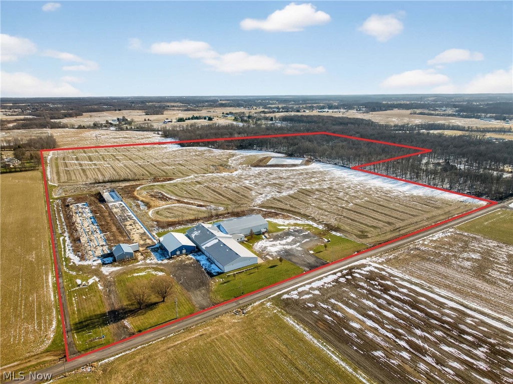 Commercial Cold Storage & Agricultural Facility on 95+ Acres | Stark County, OH Exceptional opportunity to acquire a large-scale commercial and agricultural property at 2280 Deerfield Ave NW, Dalton, Ohio, located in Stark County. This versatile property features a 30,600± square foot primary building situated on 95.37 acres, including approximately 53 acres of productive, farmable land. Previously utilized as a food distribution warehouse, the property is well-suited for cold storage, food processing, agricultural operations, logistics, or redevelopment. The main building includes two separate cold storage units providing an estimated 289,000 cubic feet of cold storage capacity, ideal for temperature-sensitive inventory and distribution. The facility also offers two separate dry storage areas totaling approximately 7,500 SF and 5,080 SF, allowing for flexible warehouse, processing, or operational use. An additional barn further enhances the property’s agricultural and storage capabilities. Strategically located just minutes from US Route 30, the property provides convenient regional access while maintaining a rural setting. A large retention pond on-site supports drainage and adds functional infrastructure value to the land. With substantial acreage, significant cold storage capacity, and multiple storage configurations, this property presents a rare combination of industrial functionality and agricultural utility in a highly accessible Stark County location.