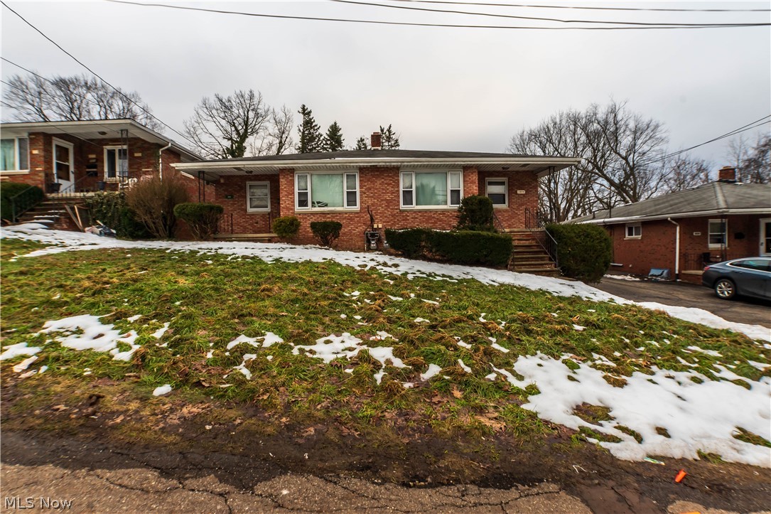 This is an investors dream! Welcome to this beautiful maintained 2 bedroom brick duplex offering a blend of comfort and convenience designed for functionality. The unit has the convenience of in unit laundry and off street parking with a shared garage and an additional parking space. If this property interests you, there are four additional properties for purchase 1012-1014 Saxon Avenue, 1024-1026 Saxon Avenue, 1030-1032 Saxon Avenue and 1062-1064 Saxon Avenue. The photos shown for MLS#5185375 Unit 1064  Saxon Avenue offer the general layout of the additional units.