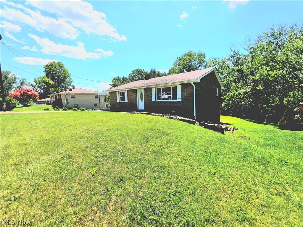 Welcome to this beautifully maintained updated brick ranch in the Bantam Ridge subdivision. Conveniently situated near schools, shopping, dining, and everyday amenities. Natural light fills the home through large picture windows that brighten both the spacious living room and the oversized kitchen. The kitchen offers abundant storage space with newer appliances, including refrigerator, range, microwave, and dishwasher. There are three comfortable bedrooms and a bright, full bathroom highlighted by a granite tile tub and shower surround. Neutral flooring and paint colors throughout create a warm, inviting setting that is ready for your personal touch. The lower level boasts generously sized family room featuring direct access to the backyard. Adjacent to the family room is an oversized one-car garage. Buyers will appreciate the flexibility this area provides and the opportunity to customize the space to fit their individual needs and preferences. Step outside to enjoy a large back yard.