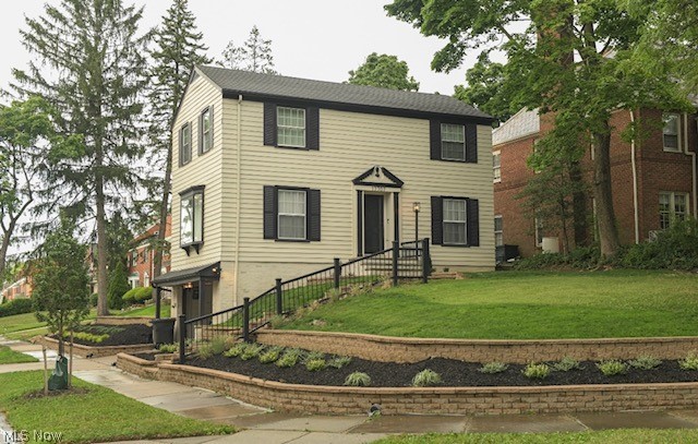 WELCOME to Shaker Heights. This beautifully renovated Colonial nestled in the heart of Shaker Heights is a must see! The home has all the character Shaker homes provide with a modern FLARE! This fully renovated home underwent a complete transformation in 2023. This charming 3 bedroom 1.5 bath corner parcel; Colonial with AMAZING curb appeal demands attention! The home features newer flooring, newer carpet, newer fixtures, freshly painted, a fully remodeled kitchen with high-end appliances, a built-in wine cooler, granite counters, soft close cabinets, custom backsplash, green and gold color swatch; perfect for culinary enthusiasts; with access to the deck for your morning coffee, fully renovated bathrooms that are breathtaking. The living room is serine with fire place and large windows providing a perfect ambiance. The office/ study is an added extra! The three large bedrooms ensures comfort for your family. A finished basement offers additional entertainment space and includes a laundry area with cabinets, sink and top of the line stackable washer and dryer. This home has been meticulously maintained with a newer roof, hot water tank, furnace, updated electrical, updated plumbing and HVAC/ AC system. Property is violation free! Home Warranty Included!!!