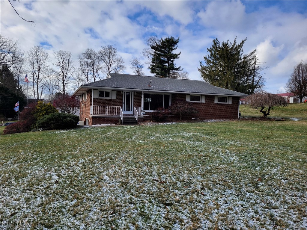 Ranch, brick home with 3 bdrms on large, level lot. Home offers living room with woodburning fireplace, nice family room, 3 bds with hardwood floors and full bath on the main level. Per seller there are hardwood floors throughout.  Full basement has additional toilet, shower and sink, garage and lots of storage.  There is a large level lot with tons of room for entertaining and additional parking.  Make your appointment today. Bring your ideas to make this home your own. Property sells as is with buyers right to inspections.