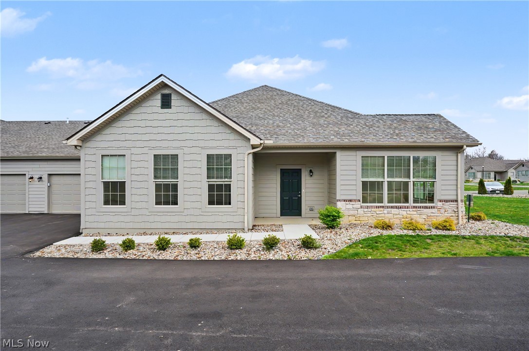 This Unit Offers 2 Bedrooms 2.5 Baths, Sun Room, Large Kitchen Island With Abundant Counter & Cabinet Space Featuring Granite Counter-Tops, Oversized Pantry, Staggered White Maple Cabinetry Throughout With Soft Close Doors & Drawers, Gas Fireplace, Spacious 10 Foot Tray Ceilings, Insulated & Painted Two Car Garage With Front And Attic Storage Space, Tiled Master Shower, Large Walk In Closets, 10x16 Outdoor patio With Privacy Fence/Gate And Much More. Situated In An Adult Clubhouse Community Featuring A Large Community Room, Fitness Center And Heated Salt Water Swimming Pool. Close To Shopping, Dining, Entertainment And Freeway Access. Full One Year Builder Warranty.