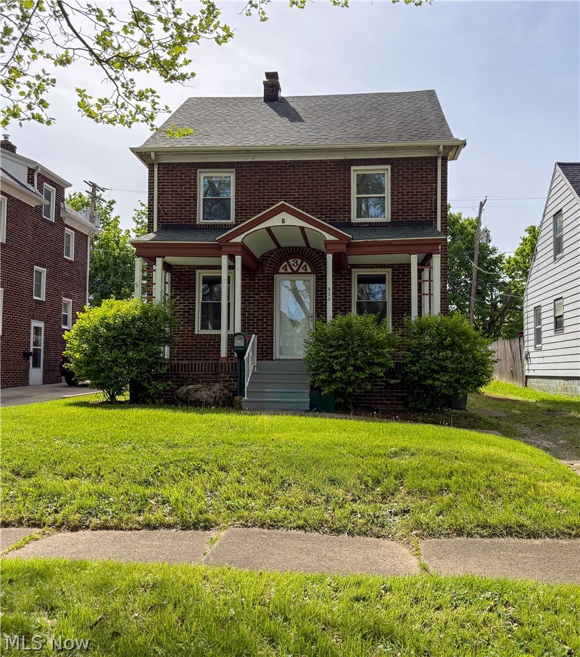 Charming all-brick two-story home featuring original woodwork and classic character throughout. Spacious living room with fireplace, formal dining area, and updated kitchen with white cabinetry and modern finishes. Rear family room offers additional living space with access to a backyard deck. Upstairs includes generously sized bedrooms with hardwood floors and an updated full bath. Full basement provides ample storage. Convenient location near schools, shopping, and major routes. Move-in ready!