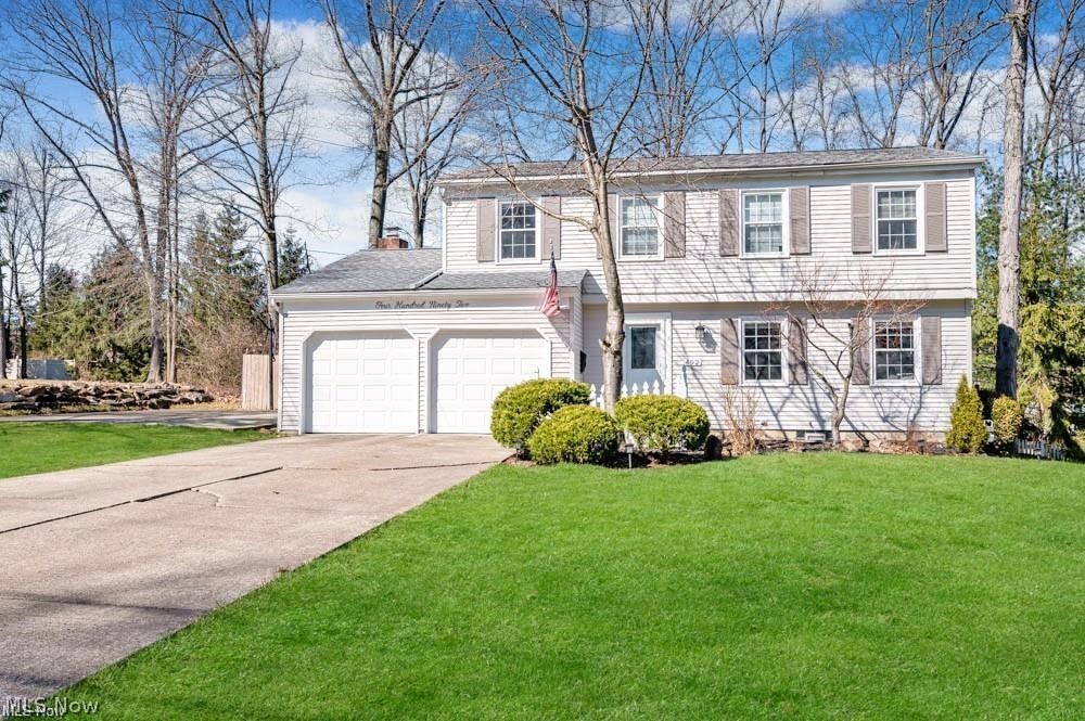 Step into a fully remodeled 4-bedroom, 2.5-bath Canfield home that blends modern design with timeless comfort. Natural light fills the spacious first floor, highlighting thoughtfully updated living areas that flow seamlessly from room to room. The new kitchen features abundant cabinetry, a large farmhouse sink, stainless steel appliances, a pantry, and an eat-in area—perfectly positioned between the formal dining room and the warm, inviting family room. Recessed lighting, sleek fixtures, crown molding, wainscoting, and beautiful hardwood floors elevate the entire space. A convenient half bath completes the main level. Upstairs, the primary suite offers a walk-in closet, additional sitting area, crown molding, and shiplap accents. Three additional bedrooms with hardwood floors and a well-appointed guest bath featuring a large illuminated smart mirror complete the second floor. The partially finished basement adds even more usable space with LTV flooring, a generous rec room, and a separate laundry/storage/work area. Outside, enjoy a quiet, park-like setting with a spacious back patio—ideal for outdoor furniture, a fire pit