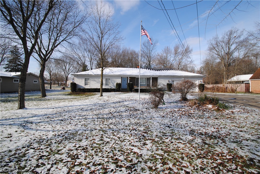 Estate Sale .... 1,856 SF Attractive Ranch with Basement .... Rare Find 1.7 Acre Wooded Setting Across from Metro Park (See MLS Attached Property Map) .... Large Rooms Throughout .... Huge Eat-in Kitchen with Appliances Open to 23' Family Room with Cozy Brick Wrapped Fireplace .... Spacious Living Room Ideal as a Formal Dining Room .... 1st Floor Utility Room .... 2.5 Baths .... Large Master Bedroom with King Size Walk-in Closet and Private Master Bathroom with 4' Shower .... 2 Other Large Bedrooms with Double Closets .... Newer Furnace .... Central A/C .... 20' Concrete Patio .... Over-sized 2 Car Attached Garage (30' x 22') with 14' Work Station ....  Needs Decorators Touch and Some Updates