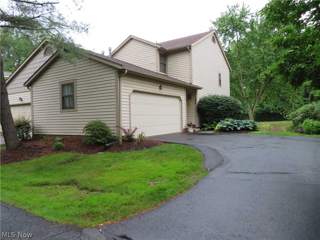 Welcome to your peaceful condo in Jackson township! This condo is loaded with updates & amazing amenities. Two bedroom one full bath and two half baths. 2 car garage attached. A cozy wood burning fireplace perfect for cold Ohio winter nights! Updated kitchen, bathroom vanity & countertops, brand new bamboo hardwood floors throughout the beautiful family room. Step outside to your deck with a gorgeous water view with a 1/4 mile walking trail! Enjoy the full basement with a half bath with a bar, great for entertaining with friends and family! Enjoy cooking in your updated kitchen with new appliances, beautiful backsplash with subway tile with a trim of stone and motion sensor countertop lighting. Hot water tank 2018, Dishwasher 2019, garbage disposal 2019.