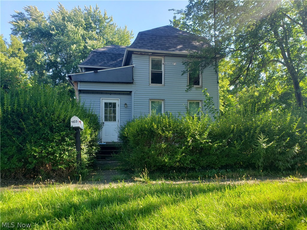 To all those that are interested in mechanics or have been on the search for a property that has a large garage,  this may spark your interest! 2 bedroom 1 bathroom home located on a dead-end street with just under a quarter of an acre. With vaulted ceilings in the kitchen, and a new roof in 2022, this 1908 beauty is ready for your revitalization. The best feature is this garage space. 3 bays with the potential to fit 4 cars with office space, a bathroom in need of some repair, and a compressor room. The lift does not stay. Take the time to tour this property to see the potential.