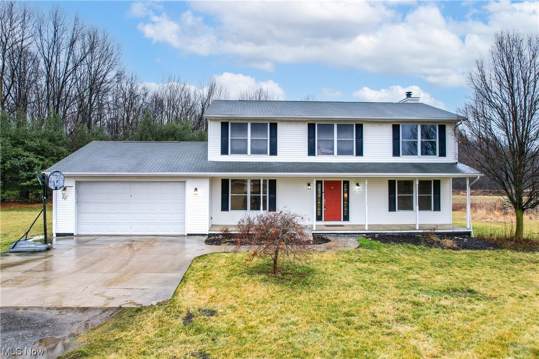 4 ACRES! Large colonial – 4 bedrooms, 2 ½ baths, 2 plus car garage!  Welcome home to this spacious open colonial!  Large entry – spacious living room to the right and formal dining room to the left.  The living room is also open to a large family room with a cozy wood-burning fireplace, informal dining area, breakfast bar, and kitchen.  All appliances remain.  The first floor also includes an updated ½ bath and dedicated laundry room.  There is convenient access to the 2-car garage.  The 2-car garage also features an additional storage or workshop area.  The refrigerator in the workshop area remains.  New luxury vinyl plank throughout the first floor (2023)!  The stairs, upstairs hall, and one bedroom have new neutral carpet (2023). The large owner’s suite includes a large shower, dual sinks, and a large walk-in closet. There are 3 additional large bedrooms upstairs as well as a main bath.  The basement is large, dry, and a great place for storage or an additional living area!  The pro