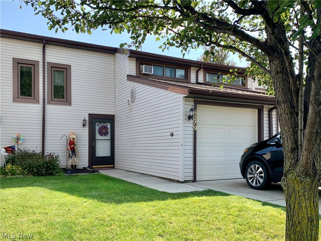 Move-in ready 3 bedroom, 1 1/2 baths townhouse condo in sought-after Forest Park Drive in North Ridgeville.  Home offers open-concept living room, dining room, and kitchen including a pantry.  Also first floor half bath, laundry, and access to attached one-car garage with opener.  For relaxation, step through the slider to the private patio.  The second floor has a large master bedroom, two more bedrooms with large closets, and a full bath. Many updates done over the last four years:  Vinyl laminate flooring on the entire first floor, Kitchen backsplash and countertops, carpeting going up the steps, light fixtures and ceiling fans throughout, both toilets. All appliances stay:  Four window air conditioners, dishwasher, microwave, refrigerator, oven, disposal, washer and dryer (freezer in garage not included).  Located close to shopping, restaurants, and highways yet peaceful neighborhood.  North Ridgeville School District.  Call today for your private showing.