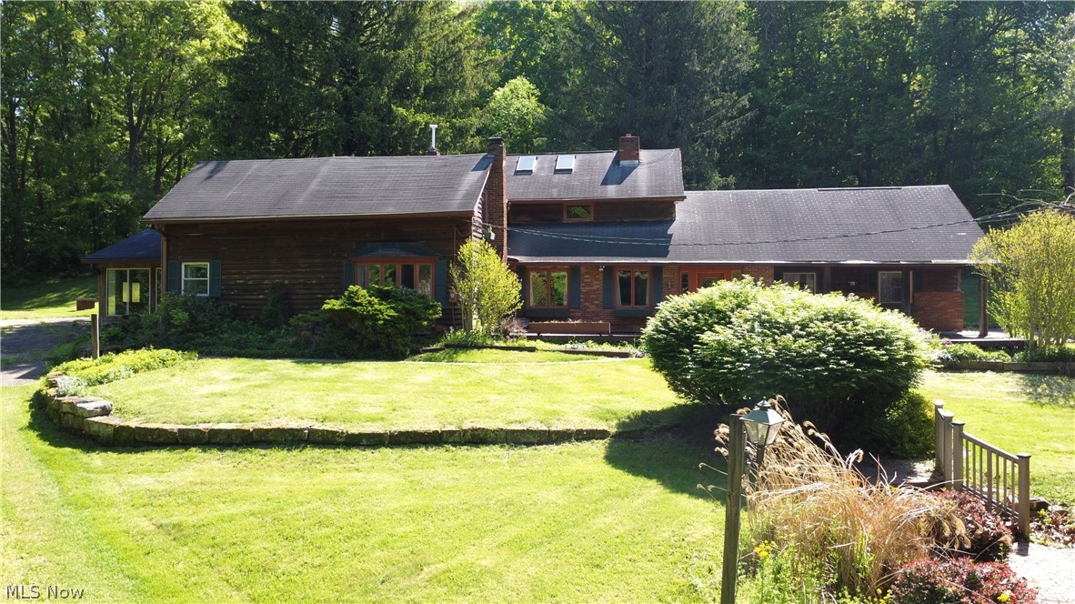 An incredible opportunity to either resume a beloved Bed & Breakfast or easily convert to a private home for outdoor enthusiasts! Angelwood Hideaway has not only served as a traditional B&B but an event center for an abundance of special occasions, such as family gatherings, business meetings, funerals, church retreats, crafting workshops, class/family reunions, weddings and more!  Surrounded by stunning country views, this property offers nearly 37 acres, mostly wooded, w/ a 6-stall horse barn, covered picnic pavilion & private pool w/ a 46 ft deck & hot tub. Inside, the impressive 25 ft entry hall beckons guests to admire nearly 5,000 sqft, 6 bdrms, 5.5 baths & a fascinating collection of textures including hardwoods, brick & natural slate. Five bedrooms feature an ensuite & 2 access the balcony. The expansive kitchen w/ abundant cabinetry is open to the dining room & highlights 1 of the 6 fireplaces. The spacious gathering room is adjoined by a private serving room w/sink & the large sunroom is perfect for buffet or additional seating & conveniently leads to the back patio. Chase your dream & schedule your showing today!