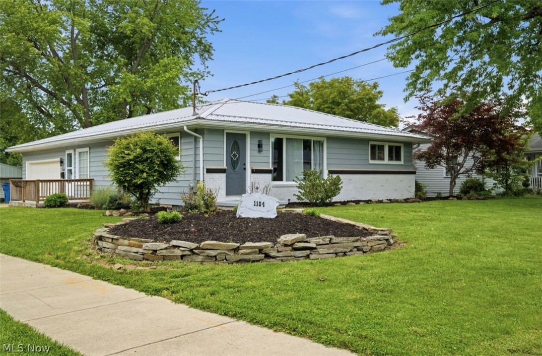 You are not going to want to miss this one. A beautiful fully remodeled 3 bed, 2 full bath Ranch located close to Girard High school. This home sits on a corner lot with sidewalks that run throughout the neighborhood. When you enter the side door you walk into a family room with a corner fireplace and sliding glass doors that lead outside to a concrete patio. The main floor offers an updated kitchen with granite countertops, center island seating, and ample storage. A spacious living room, full bath, and 2 generously sized bedrooms. The finished basement includes additional living space, a bar area with mini fridge, full bath, 3rd bedroom, and laundry area. Enjoy the outdoors bug-free in the enclosed patio attached to the garage. Brand new metal roof, paint, flooring, lighting and ceiling fans, appliances  and much much more. Schedule your private showing today!