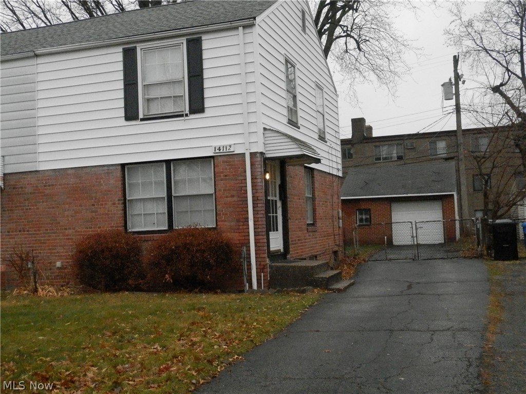 Move right in to this sparkling 1/2 Duplex with full garage.  2 Bedrooms, 1 full bath and basement.  There is new flooring in Living Room, Kitchen, 2 bedrooms, stairs and hallway. Many rooms have been freshly painted.  More space and cheaper than renting.