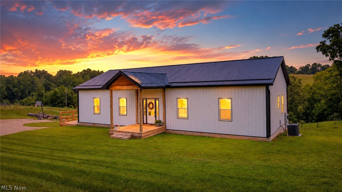 Welcome to 2244 N Parmiter Rd NE, McConnelsville, Ohio! Situated on approximately 2± acres, this stunning new construction home offers the perfect blend of modern luxury, quality craftsmanship, and peaceful country living. Conveniently located just minutes from McConnelsville and Morgan High School, you’ll enjoy the serenity of a rural setting while remaining close to everyday conveniences.

Step inside to an open-concept floor plan featuring impressive 10-foot ceilings throughout the main level, creating a bright and spacious feel. The main floor offers 3 bedrooms and 2 full bathrooms, showcasing Schaad Custom cabinetry, quartz countertops, custom tile walk-in showers, freestanding bathtubs, and beautiful finishes throughout.

The finished walkout lower level features 9-foot ceilings and provides additional living space, including a 4th bedroom, 3rd full bathroom, office, and family/recreation area—perfect for guests, entertaining, or multi-generational living.

Outside, you’ll find a spacious wraparound deck extending from the side entry around the back of the home, providing the ideal space to relax and enjoy the breathtaking hillside views. Whether you’re hosting friends or unwinding after a long day, the outdoor living space offers a true retreat.

Built with quality in mind, the home also features poured concrete foundation walls and exceptional attention to detail throughout. Combining functionality, comfort, and style, this property is ready to welcome its first owners.
You can also purchase this home with up to 13 acres for additional money. 

If you’re looking for a move-in-ready home with modern amenities, scenic views, and exceptional craftsmanship, this property is a must-see.