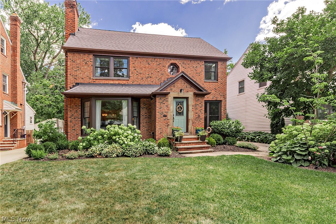 Classic architecture is complemented by refined, sophisticated interiors in this beautifully maintained brick Colonial, offering nearly 3,000 square feet of finished living space across four levels. Years of careful stewardship have preserved the home's original charm while incorporating quality updates throughout. The gracious foyer opens to beautifully proportioned rooms filled with warmth and natural light, including a handsome den with custom built-in bookcases and a coffered ceiling, an expansive living room with fireplace, and a formal dining room featuring the original built-in cabinet. The remodeled kitchen blends classic style with modern function, offering GE Monogram appliances, a pot filler, abundant cabinetry, and a breakfast nook. The adjoining butler's pantry, laundry area, and family room flow naturally to the deck, patio, and backyard. The second floor offers three spacious bedrooms, including a primary bedroom with a walk-in closet, and a renovated hall bath with an oversized walk-in shower. The third floor offers a private suite with a renovated full bath, while the finished lower level expands the home's finished living area. Successive owners have made extensive improvements, including a remodeled kitchen and baths, Pella replacement windows, roof, electrical service, driveway, exterior doors, garage door, landscaping, fencing, and many other updates. Recent improvements include a new furnace and central air conditioning, GE Monogram appliances, updates to the first-floor half bath, renovation of the third-floor bath, custom built-ins, enhanced lighting, and new carpeting on the third floor. Thoughtfully updated while preserving its original architectural integrity, this is a home that has been cared for with an uncommon level of pride.