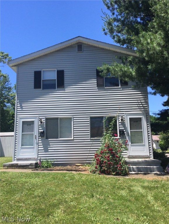 Very Nice updated investment or 1st home opportunity. Nothing to do but move in and rent the other side. Or rent out both side and enjoy the income. Make sure to look through all the pictures as there is a lot here that you do not normally get with a duplex home. This home is situated in a traditional side street. There is ample parking behind the home. There is a large gravel drive way next to a beautiful deck to enter the home. There is a large yard normally not found with these properties. So there is lots of space. Each unit enjoys their own private basement along with a washer and dryer that stays with each side. The home comes with appliances also. Very nice location if your looking for quick access to the central interchange. You are minutes from 224, S. Arlington,  77 north or south. Mapquest puts you at 26 Minutes to Canton, 45 Minutes to Cleveland and 11 minutes to Chapel Hill Mall. You dont want to over look this opportunity. Call today for a private showing.