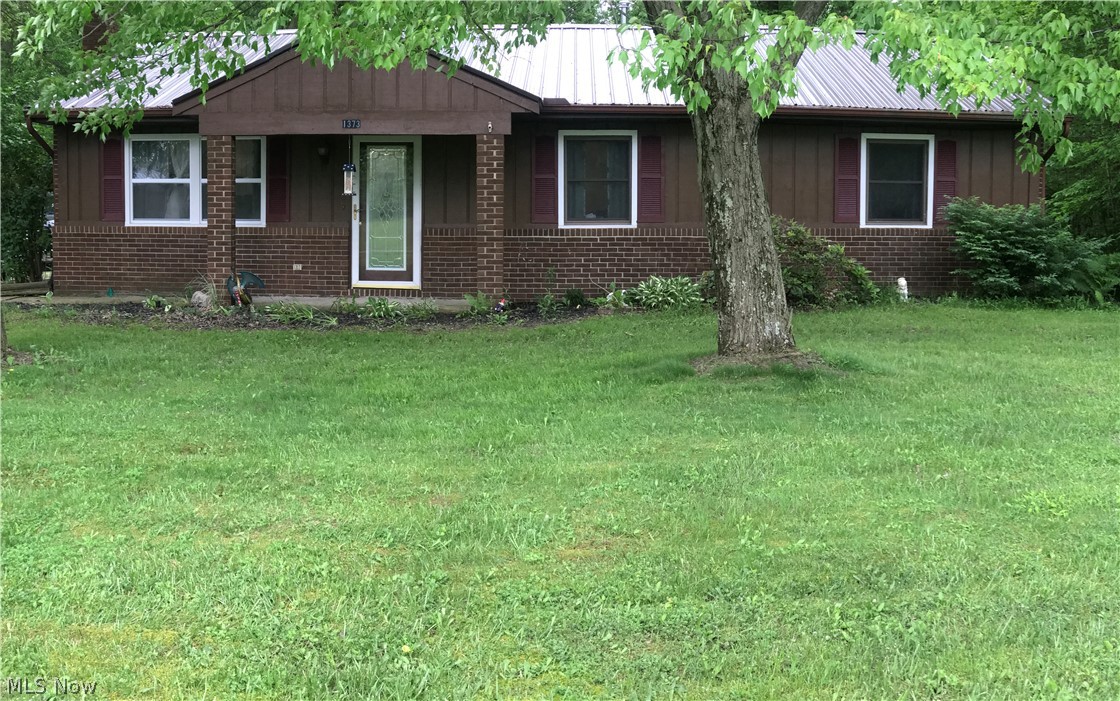 Welcome to Cinnamon Lake! This home has had many recent updates. New Roof 2018, Central Air and Furnace 2018, New Windows 2018, New windows and screen door in the large enclose sun room, lights in garage 2019. Duct work for forced air/AC 2018, You have the option to use Electric Base board heating or the propane gas forced air heating. Hook ups for gas FP if you choose. Custom made Amish kitchen cabinets. Enjoy your space because this home sits on 2 parcels