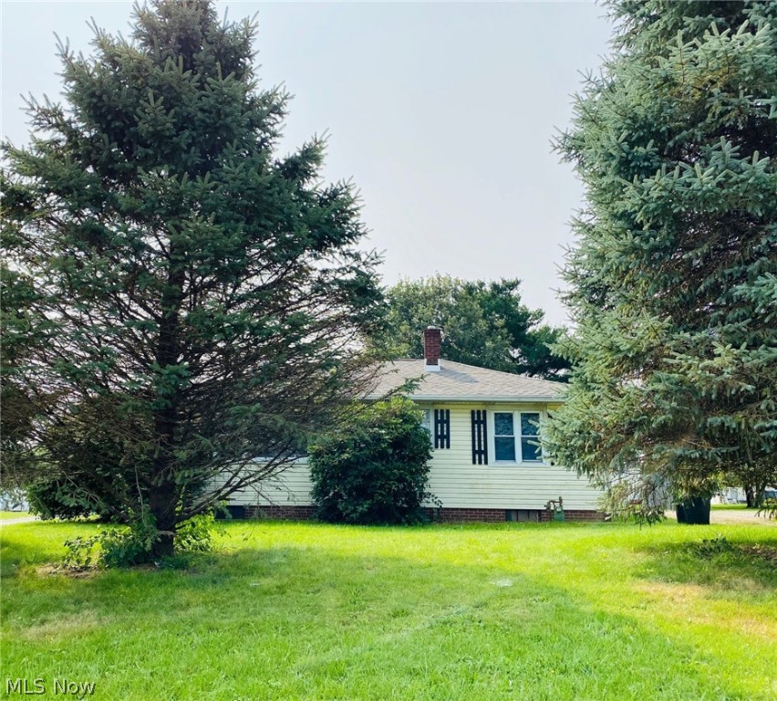 Triway Schools, Wooster Township and easy highway access make this little house perfect on so many levels.  The side entrance breezeway leads you to either the kitchen or the oversized 2 car garage that has a heating system in place (though the current owner has never used it and does not validate its working condition).  Once inside the kitchen, you will find an open floor plan that includes an eat in kitchen with clear sight lines into the office/den or living room.  Both of the bedrooms and the bathroom are down the hallway and at the end.  Fresh paint, flooring, lighting and a new roof make this a true winner that will not last long.  Well and septic mean no water and sewer bills.  The shed has electric and is in great condition.  These houses are hard to find.  Come and be a part of Wooster history and make this your next family home.
