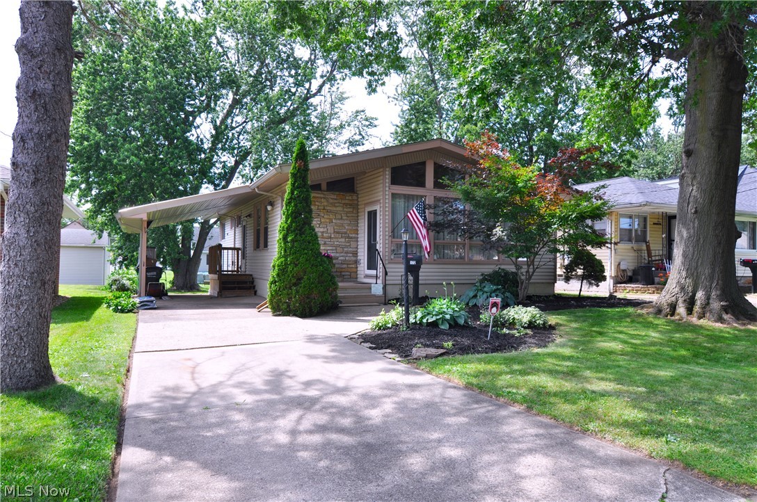 Welcome Home to 172 27th St! Located steps away from a local park and schools within walking distance! This home has loads of updates and space! New Roof installed June 2025!!! Enter off your cozy front porch into your family room with skylights and vaulted wood ceilings! Open concept connects your family and eat in kitchen area. New lighting and updated electrical through out! Your kitchen has tons of cabinets with storage closets throughout the first floor. Built in shelves and drawers give you all the space you need! All 3 bedrooms are on the first floor and have new carpet. Full Bath with first floor laundry option gives you one floor living. Walk in shower with updated surround and vanity. All appliances stay including both washer and dryer sets. Downstairs you will find your walk out basement with  second laundry room area and half bath. Updated sink, lighting and plumbing in half bath. Your main basement area includes a finished family room with bonus built in office area ready for your finishing touches. Wood burning stove stays. Your garage entry is off the basement and is extra deep for storage. Schedule  your showing today!