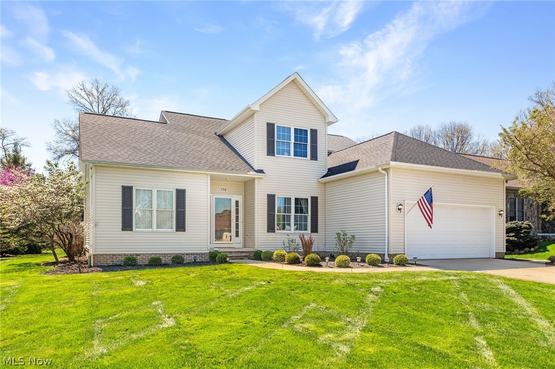 Welcome to a stunning retreat in Sagamore Hills Township! 758 Southridge Rd sits on a prime corner lot in Southridge Estates offering superb curb appeal, decorative concrete sidewalk, coach lights, and an inviting front entryway framed by sidelights. Lush landscaping blends mature trees with a refreshed palette of plantings, creating a park-like setting that flows to a private, peaceful backyard and a brick patio. Inside, the entrance foyer opens to a dining room and a great room featuring a grande chandelier and modern light fixtures. The great room soars with vaulted ceilings bathed in natural light, expansive windows, and fresh neutral paint. A warm fireplace with ceramic tile surround and wood mantel anchors the living space, while the open kitchen showcases beautiful hardwood floors, a full renovation, and classy quartz countertops. The new center island, tile backsplash, stainless steel appliances, built-ins, updated lighting, and abundant custom cabinetry with crown molding will elevate every meal and gathering. Adjacent, is the sunlit family room/sunroom, extending from the kitchen with tons of windows and a slider to the back patio oasis. The large 1st-floor master suite offers a private retreat with an ensuite glass-door shower, soaking tub, and a large vanity with storage. Upstairs, there are two spacious bedrooms and a full bath with a versatile loft area. An extra-deep garage with a workbench and storage shelves adds practical appeal. This home blends tranquility with modern convenience, close to Cuyahoga Valley National Park, dining, and local amenities, with easy highway access. It’s an entertainer’s dream—indoors and out—on a generous corner lot in a location known for being surrounded by paths of nature. Major updates include a new roof, full kitchen renovation, new HVAC, new hot water tank, fresh interior/exterior paint, new landscaping, new master carpet, and new light fixtures. Schedule your private showing today- you won't be disappointed!