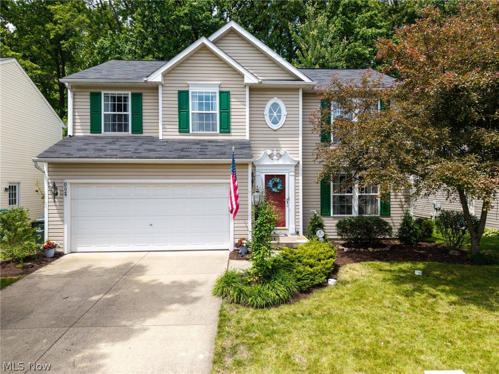 Welcome home to this beautifully updated 4-bedroom, 2.5-bath home nestled in desirable Olmsted Township! Backing up to a peaceful tree lined setting, this property offers the perfect blend of privacy, comfort, and modern style. Step inside to gorgeous hand-scraped hickory hardwood floors flowing throughout the first floor and into the open, spacious kitchen featuring granite countertops, a farmhouse sink, and plenty of room for entertaining. Double pocket doors add charm and functionality, leading to the convenient first-floor laundry and half bath. The laundry room also includes added cabinetry for extra storage and organization. Upstairs, the spacious master suite features a private en suite bath and a custom walk-in closet designed for maximum storage. Additional updates throughout the home include newer sinks and toilets for a fresh, modern feel. The finished lower level provides additional living and entertaining space, while the tankless hot water heater adds efficiency and convenience. Outside, enjoy relaxing or hosting gatherings on the paver patio overlooking the fully fenced backyard with a wood privacy fence and beautiful wooded backdrop. Completing the home is a 2-car attached garage. This move in ready home combines thoughtful updates, functional living space, and a serene setting all in a fantastic Olmsted Township location!