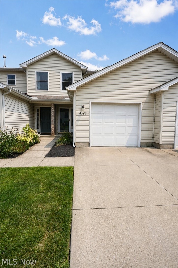 Welcome to this beautifully maintained two-level condo with a townhouse feel, located in the heart of North Ridgeville! Offering over 1,400 sq ft of well-designed living space, this home features a smart layout with the kitchen, dining area, family room, foyer, laundry, and half bath all on the first floor—perfect for everyday living and entertaining. Upstairs, you’ll find two spacious bedrooms, each with its own private full bathroom, plus a flexible bonus area ideal for a home office, extra storage, or even a custom walk-in closet. The kitchen boasts granite countertops and flows seamlessly into the open-concept dining and living areas. Enjoy generous closet space throughout, and step outside to your private concrete patio surrounded by greenery—perfect for grilling, outdoor dining, or simply enjoying a quiet moment in nature. This move-in-ready condo combines the comfort of a single-family home with the ease of condo living. Ideally situated just minutes from Avon Commons, Center Ridge Road, shopping, restaurants, and more—don’t miss your opportunity to call this peaceful and convenient location home