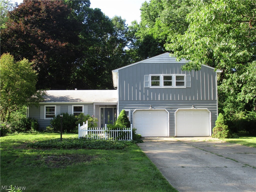 This one has had quite a bit of abuse but good bones for all of you flipper's or handy people.  Over 2,500 sq. ft plus basement. Loads of living space with 2 living areas, dining room, 3-bathrooms, 4-total bedrooms.  Master suite with full bath and 7 x 7 walk-in closet.  Very nice 19 x 16 patio enclosure off the back not included in living space, not heated.  Trex deck and wooded views.  2-car attached garage with concrete driveway.   Major components appear to be in working order.  Home will need cleaning, painting and flooring throughout, bathroom repair, woodwork and door replacement at a minimum.    Hot water heater new in 2008.  Sump pump new Nov 2017.  Laundry chute from upper floor to main floor laundry/utility room with new sink and faucet.  2-furnaces - one in laundry room and one in basement.  Purchase would most likely need to be cash or rehab type loan.   Property was heated through the winter months.  Sweat Equity is waiting for you.  Home is priced with repairs in mind. B