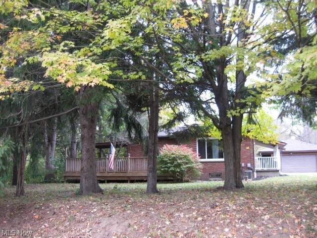 Looking for Country Living then Welcome Home! Brick Ranch, Yet close to restaurants, shopping & expressway. There is woods & a pond on property. Home is completely redone. All appliances, newer kitchen, 1 bathroom, oak hardwood flooring in living room & hall way. Two bedrooms-Master, brand new carpet, second bedroom-built in storage unit. Crown molding thru out home. Lots of room for extra storage in waterproofed full basement which includes a French drain. Possible hook up for second bathroom. 28x19 Deck partially covered on front of home. 12x6 Side Porch entry to kitchen. Up Dates: Well Pump 2018,
New Hot Water Tank 2017, New Septic 2013 & Updated Electric. Whole house water filtering system. Bryant Furnace & Air Conditioner has recently been serviced. Two car garage 23x23. Electric 220, Electric Base board heat on West wall side of garage plus door opener. 22x8 Lean to attached to back of garage. Out building 32x26 Includes room that could be used for Crafts, Hobbies or Work Shop w