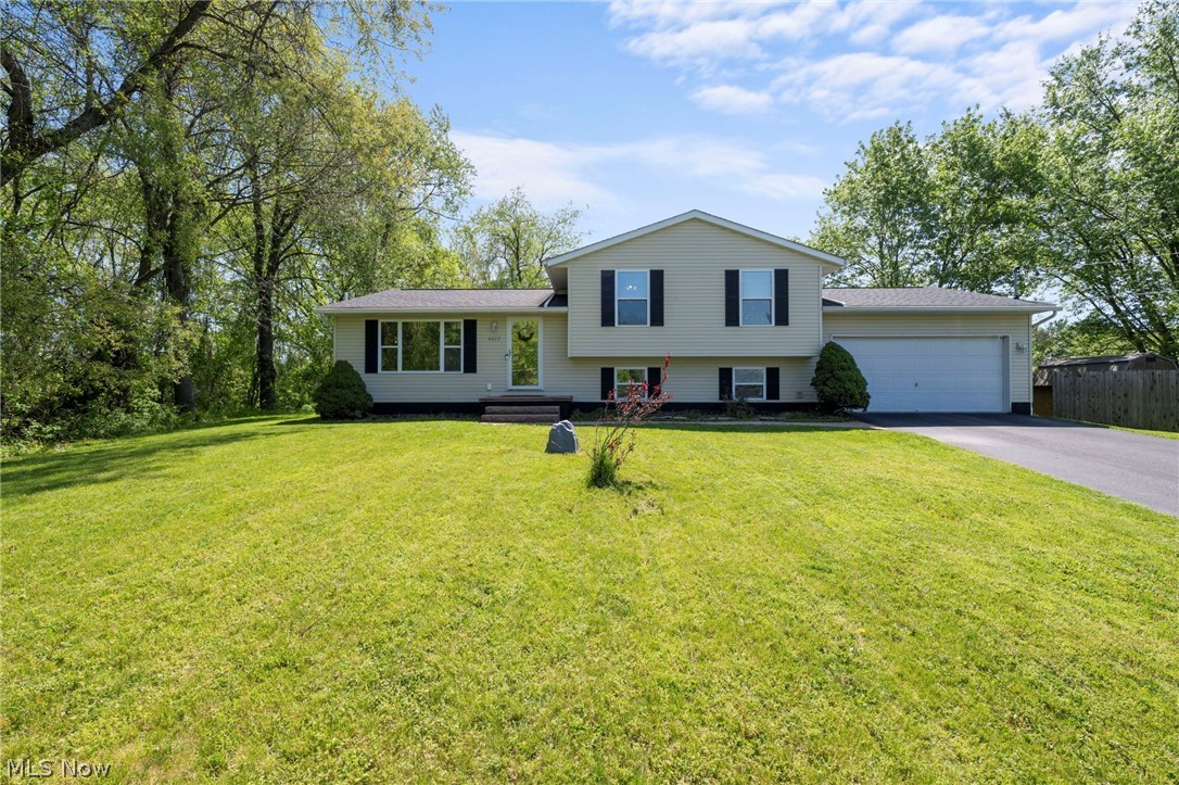 This beautiful three-bedroom, three-full bath home in Jackson Township comes with a professionally waterproofed, totally finished and flexible bonus room in the basement. Complete with a stone fireplace for aesthetic in the spring-summer months and cozy warmth in the fall-winter. Whether you want a home theater, a playroom, or even a hobby space. This home is not just three bedrooms and three baths, it's got that extra space downstairs that will fit whatever your lifestyle needs. Residential window tint on all front windows of the home allows you to enjoy the beautiful front yard scenery with comfort and privacy. New well pump installed April 2026. New water softener and reverse osmosis drinking water filter installed May of 2024. Roof installed April of 2019. This home has everything you need, reach out to see it in person and decide if it's the right fit for you. Offering a Home Warranty.