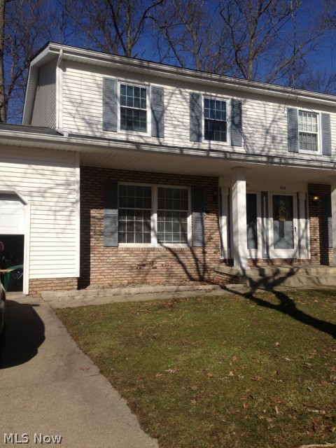Stunningly remodeled town home style unit available for rent in Stow! Fantastic bright, sunny and clean unit redone from top to bottom. Plenty of counter space in this modern eat in kitchen. Dining area opens to the spacious and bright living room. Bedrooms are very large, master has double closets! Full basement with washer and dryer hookups. Back patio off the kitchen overlooks the wooded lot. 2 car garage. Dont miss it! All adult occupants must apply online for credit criminal and eviction history.  Income verification required. $35 application fee. No smoking, no section 8.