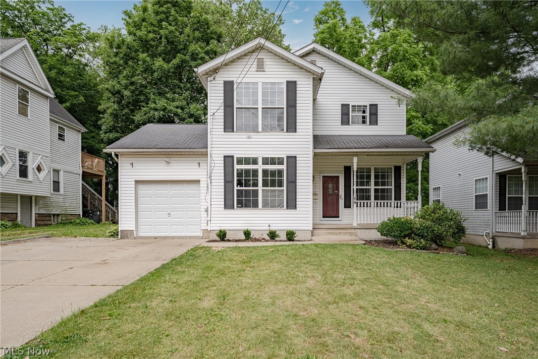 Welcome to 64 Byers Ave, a newer-built home in Akron's popular Highland Square neighborhood offering modern comfort, inviting living spaces, and a functional floor plan designed for everyday living. A welcoming front porch leads into a spacious living room filled with natural light. Sliding doors provide easy access to the back deck, creating a seamless connection to the outdoor living space.The living room flows into a well-appointed kitchen featuring stainless steel appliances, updated LVP flooring, and ample cabinet space. Just beyond, the formal dining room offers a comfortable setting for everyday meals and entertaining. Its convenient location allows access from both the kitchen and main living area. A half bath completes the first floor. Upstairs, there are three bedrooms and two full bathrooms. The primary suite features a private ensuite bath, while a second full bath serves the additional bedrooms. The full basement is clean, spacious, and offers high ceilings, providing excellent storage and future finishing potential. Outside, the deep backyard offers plenty of room to relax, garden, or entertain. An attached one-car garage and additional parking pad add everyday convenience. Combining modern comfort, flexible living space, and a desirable Highland Square location, this home is ready for its next owner!