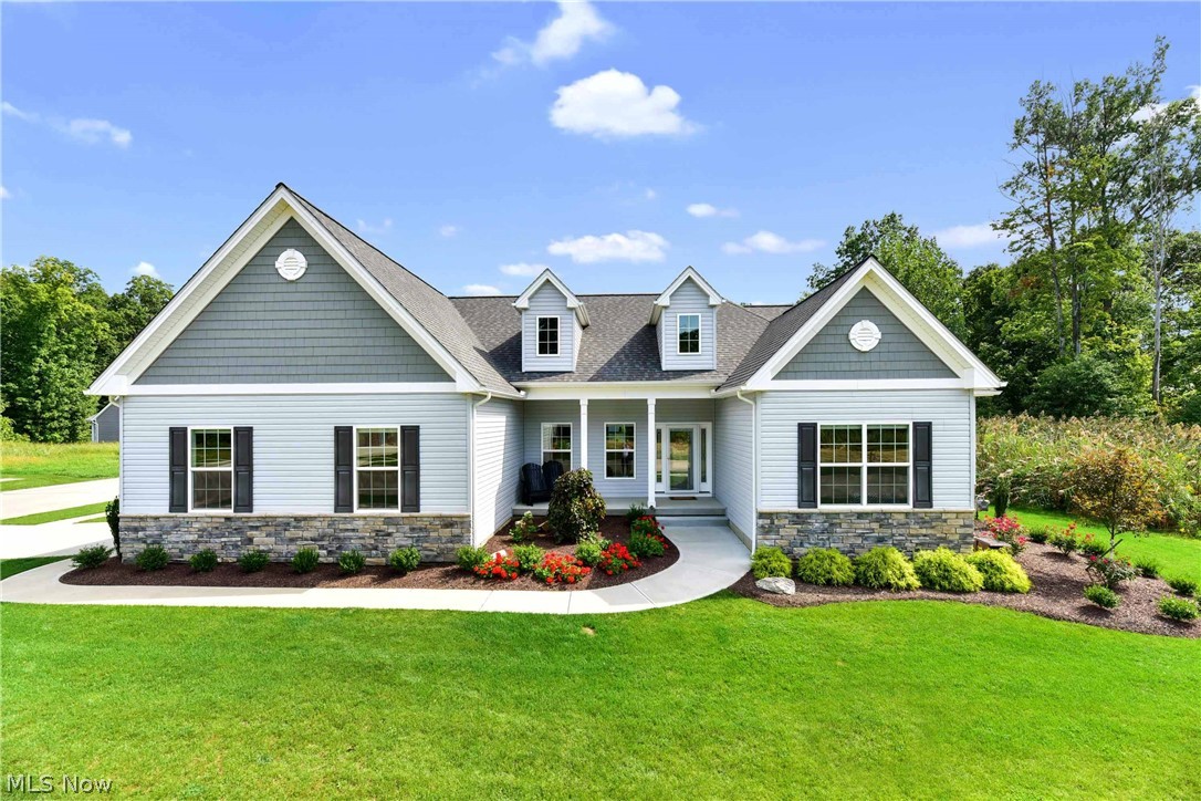 Prepare to be wowed by this stunning ranch home! Built by MBD Homes, a local custom builder & only 3 years young! This Brie Model offers the perfect open floor plan, gorgeous laminate wood floors, many windows providing tons of natural daylight, vaulted & 9 ft. ceilings. Great room with gas fireplace. Formal dining room w/upgraded chandelier & tray ceiling. Large kitchen with island & dining area, featuring granite counter-tops, subway tile back-splash & dimmable under cabinet lighting (2019). The master suite has vaulted, tray ceilings, a large walk-in closet & en-suite master bath offering a shower & soaking tub & a dual sink vanity with granite countertops. The other 2 bedrooms are both spacious with ample closet space and a shared full bathroom. Honeycomb blinds throughout. You will love the sun room with access to the new sandstone patio and views of the gorgeous yard. Convenient 1st floor laundry. Outstanding curb appeal and yard - the lawn was professionally installed and the ex