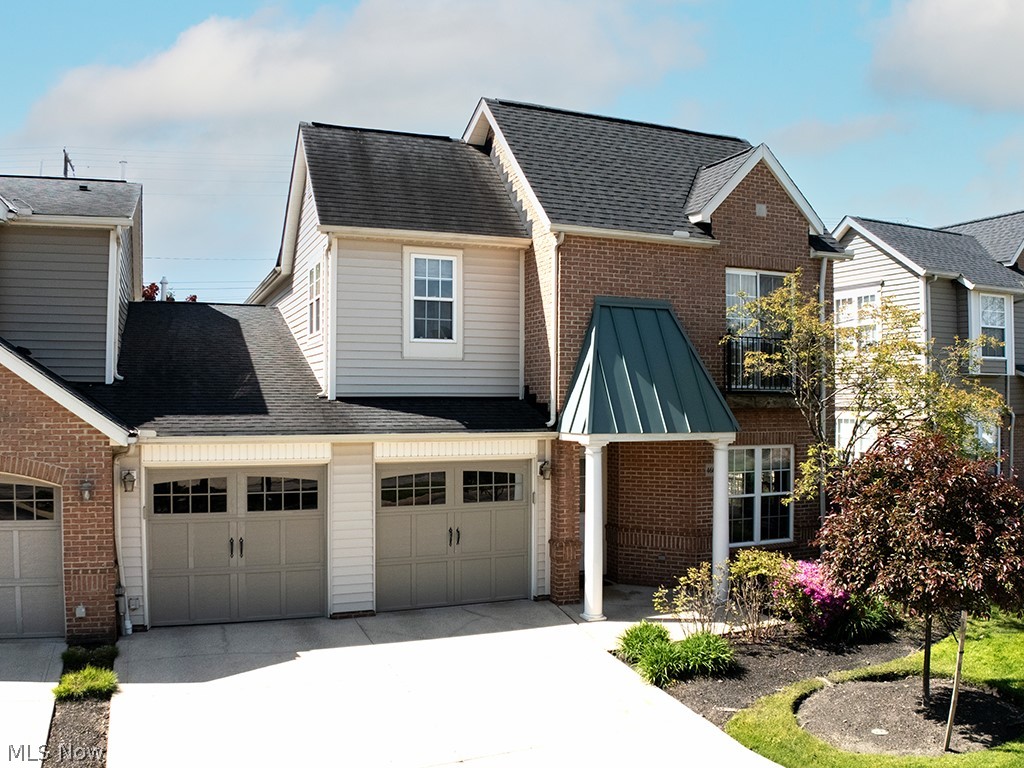 Tucked within the desirable Wildflower community, this spacious, ight-filled, and recently refreshed townhome offers over 2,500 square feet of comfortable living with an easy, low-maintenance lifestyle. A dramatic two-story entry opens to expansive living spaces filled with abundant natural light, soaring ceilings, oversized windows, recessed lighting, and a fireplace that anchors the family room. The spacious eat-in kitchen offers extensive cabinetry, generous counter space, all appliances, and sliding doors leading to the private patio. Flexible first-floor living space is ideal for a home office, den, reading room, or quiet retreat. A first-floor laundry room, half bath, and attached 2-car garage add everyday convenience. Upstairs, the oversized primary suite features vaulted ceilings, a large walk-in closet, and an en suite bath with double vanities, soaking tub, and separate shower. Two additional bedrooms and a second full bath complete the second floor. Major mechanical updates completed in May 2026 - furnace, central air conditioning unit, and hot water tank. Monthly maintenance fee includes landscaping, snow removal, common area maintenance, and association insurance. Privately situated yet close to shopping, dining, medical facilities, and freeway access, this outstanding home offers the space, comfort, and convenience difficult to find in today’s market.