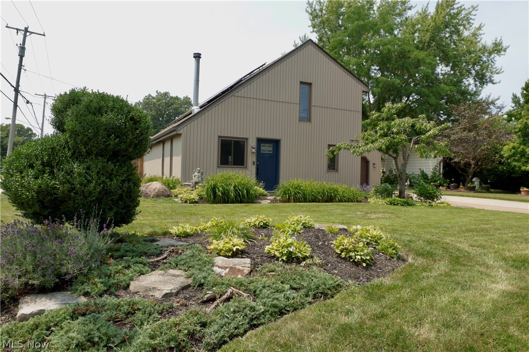 Welcome home to this beautifully updated Saltbox-style residence, where timeless character meets modern comfort. Nestled on a quiet street just blocks from Lake Erie, this home offers the perfect balance of peaceful living and everyday convenience.  Step inside to discover numerous updates, providing a move-in-ready experience with thoughtful improvements. The inviting layout offers warm, comfortable living spaces that are equally suited for relaxing evenings at home or gathering with family and friends, whether inside for the winter months or relaxing on the covered patio in the privacy of your backyard.  Spend evenings watching breathtaking Lake Erie sunsets, enjoy morning walks or bike rides along the waterfront, launch your kayak, cast a fishing line, or explore the area's many parks, playgrounds, walking trails, and recreational amenities. Whether you're looking for an active outdoor lifestyle or simply a peaceful neighborhood to call home, this location delivers.  Imagine weekends filled with picnics by the lake, community events, and the tranquility that comes from living in a neighborhood where nature is always close by.