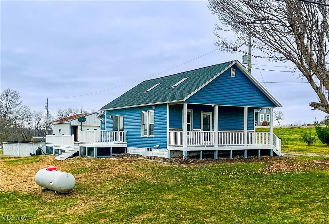 Welcome to this unique and versatile property with 1.59 acres, multiple outbuildings, finished living space on all levels, and major updates already completed. Located in the desirable Tri-Valley School District, this home provides a quiet country setting just minutes from Zanesville.

Originally built in 1951 and remodeled in 1995, the property has 900 sqft on the main floor, 720 sqft of finished basement space (with 2 bedrooms and a bathroom), and a 192 sqft finished second-floor loft with 96 sqft loft storage, allowing flexible living and storage options.

Major exterior upgrades include a brand-new roofing system, new siding (2023), and new composite decks with premium railings (late 2025) — providing excellent curb appeal and long-term durability.

Inside, the home has 3 bedrooms and 2 bathrooms, skylights for natural light, and forced-air heating/cooling & propane heating. The interior will need some updating, allowing buyers to finish it to their own taste.

Outside, you’ll find multiple outbuildings and excellent utility infrastructure, including:

• 24×48 pole barn
• 24×24 detached garage
• Small craft building
• Two water wells
• Two septic systems
• Two electric services
• High-speed internet + cable available
• County water available at the road

Enjoy summers by the 24’ round above-ground pool (52” depth), or relax on the new composite decks overlooking your private acreage.

Washington Township | Muskingum County

INFORMATION IS TO THE BEST OF OUR KNOWLEDGE. HOME IS BEING SOLD AS-IS, WHERE-IS. BUYER SHOULD VERIFY ALL INFORMATION. COST OF ANY INSPECTIONS TO BE COVERED BY BUYER.