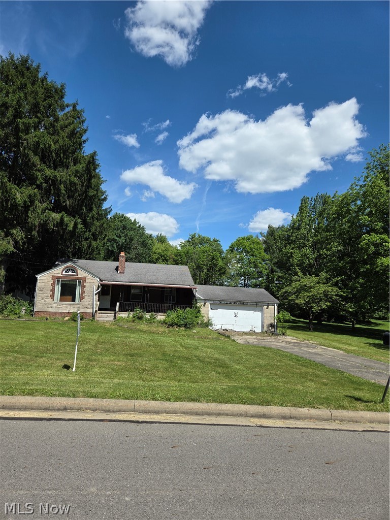 This property presents an opportunity for a buyer to add personal touches and updates to suit their preferences. The home offers three bedrooms and a full basement, providing additional storage and utility space. A 14' x 22' storage shed is located on the property, offering ample room for equipment, tools, or seasonal storage. The spacious backyard enhances the property's overall appeal and provides space for outdoor activities and enjoyment.
