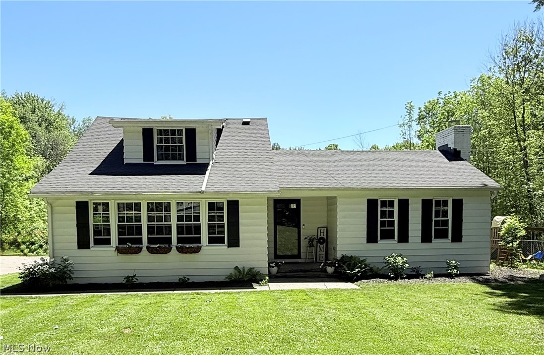 Welcome to your private Hudson retreat, where modern updates, move-in-ready condition, and peaceful surroundings come together on a beautiful one-acre lot. This thoughtfully renovated 4-bedroom, 2-bath home offers the perfect balance of open-concept living and functional space.

At the center of the home, the stunning updated kitchen is designed to impress, featuring an oversized island, abundant workspace, and seamless flow into the spacious living area—ideal for everyday living, entertaining, and gathering with family and friends. Luxury vinyl plank flooring extends throughout, creating a cohesive, stylish look that is both durable and easy to maintain.

What truly sets this home apart is the extensive list of improvements already completed for the next owner. Major updates include a complete interior renovation in 2021 with all-new electrical, appliances, and finishes, a new roof (2021), hot water tank (2023), flat roof maintenance (2023), sump pump (2024), new carpet (2025), oven (2026), and a brand-new septic system (2026). Buyers will appreciate the confidence that comes with knowing many of the home's major systems and components have already been updated.

Offering privacy, modern updates, and a prime Hudson location, this is a rare opportunity to enjoy turnkey living on a spacious lot without sacrificing convenience. This home is ready for its next owners to simply move in and enjoy. Schedule your private showing today.