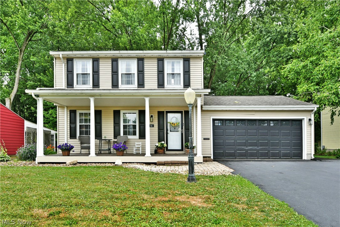 Kick off the summer with this hot new Niles listing, bringing the heat with two floors of beautifully finished living space and a backyard built for entertaining! Located in a desirable neighborhood just minutes from shopping, dining, and everyday conveniences, this two-story charmer welcomes you with a covered, pillar-lined front porch that's perfect for relaxing with a glass of lemonade and enjoying a warm summer breeze. The extended driveway provides additional parking and storage options, while the privacy-fenced backyard features a large storage shed and a stone-trimmed firepit, creating the ideal setting for evenings spent under the stars. Adding even more appeal, the screened-in sunroom offers the perfect space for dining, entertaining, or simply unwinding. Step through the decorative front door to find a welcoming foyer with a conveniently tucked-away half bath and a carpeted staircase leading above. Nearby, the inviting living room showcases hardwood-style flooring, a cozy corner fireplace, and abundant natural light streaming through the lattice-lined windows. The central dining area flows seamlessly into the beautifully updated kitchen, where rustic tones, stylish cabinetry, stone-look countertops, and decorative lighting create a warm and inviting atmosphere. Easy access to the sunroom makes indoor-outdoor entertaining a breeze. Upstairs, the oversized master bedroom steals the show with its bonus vanity area and additional closet space. Two nicely sized guest bedrooms bring the total to three, all serviced by a spacious full bath at the end of the hall. Downstairs, a partially finished basement provides additional living space while still offering plenty of room for storage and laundry services. Updates include: roof 2014, sunroom remodeled 2024, upstairs flooring 2021, kitchen 2015, basement waterproofing 2018, new driveway 2025, and so much more! Plus a one-year home warranty!