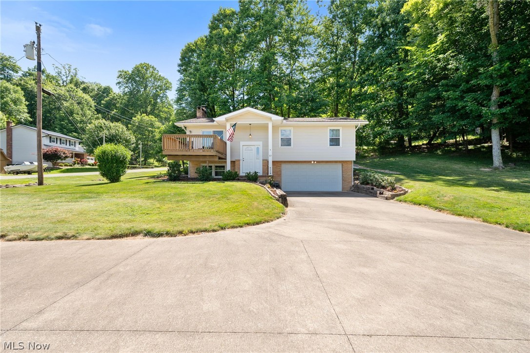 Location, location, location! Welcome to your Lake Mohawk retreat perfectly positioned on a desirable corner double lot with year-round lake views and a flat, easy-access driveway. Just moments from the main gate, golf course, and marina, this beautifully maintained 3-bedroom, 2 full bath home offers the ideal blend of comfort, convenience, and lifestyle.

Step inside to a light-filled interior where the living area captures peaceful lake views and features a cozy electric fireplace—perfect for relaxing in every season. The kitchen offers an island for gathering and everyday functionality, while natural light pours throughout the home creating a warm and inviting feel.

Enjoy outdoor living at its best with two decks—a front deck perfectly positioned to soak in those stunning lake views, and a back deck ideal for relaxing, grilling, or entertaining in a more private setting.

The main level includes three spacious bedrooms, a full bath with tub/shower combo, and a convenient linen closet. The lower level adds valuable living space with a second full bathroom—ideal for guests, entertaining, or a private retreat.

You’ll love the thoughtful storage throughout, including multiple nooks, generous closets, and easy access to attic storage. Additional highlights include a two-car attached garage, storage shed, ceiling fans in all bedrooms, whole-house generator, gas furnace (2009), and central air (approximately 5–6 years old), hot water tank (2024).

Enjoy all the incredible amenities that Lake Mohawk has to offer—from unlimited horsepower boating, fishing, and swimming to the executive 9 hole golf course, tennis/pickle ball courts, and vibrant community events. This is more than a home—it’s a lifestyle!