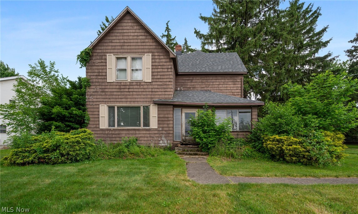 Welcome to 403 Barrett Rd., a unique opportunity situated on over an acre of land in a highly desirable location. With city approval for horses and chickens, this property offers the rare combination of space, flexibility, and convenience. Enjoy being just minutes from the Cleveland Metroparks, Rocky River Reservation, local golf courses, and a variety of shopping, dining, and recreational amenities. The home features 3 bedrooms and a flexible floor plan with plenty of room to customize and make your own. The spacious living room is filled with natural light from a large picture window and flows seamlessly into the formal dining room, creating an inviting space for gatherings and entertaining. An additional room off the dining area offers versatility as a home office, guest room, or hobby space. The eat-in kitchen provides ample cabinet space, and a full bath completes the main level. Upstairs, you'll find three generously sized bedrooms, offering comfortable living space for family and guests. Outside, the expansive backyard is surrounded by mature trees, creating a private, park-like setting with endless possibilities for outdoor enjoyment, gardening, recreation, or future improvements. Detached two and a half car garage. The recent update includes a new roof in 2024. Whether you're looking to create your dream home, establish a hobby farm, or simply enjoy the benefits of a large lot in an exceptional location, 403 Barrett Rd. offers outstanding potential. The property is being sold as-is, and the seller will make no repairs.