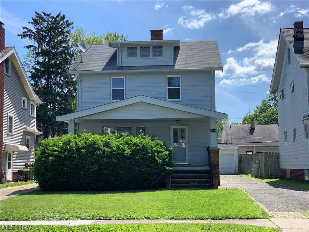 Welcome to 3927 West 158th st, Cleveland, OH! This freshly painted home features new floors throughout and new carpeting in all the bedrooms. Additional features are:  1 ½ baths, 3 bedrooms, 2 car garage and a fenced in yard. You can be creative in the unfinished basement. Lounge on the large front porch!
Large living room with decorative fireplace. There are stairs in the master bedroom closet that lead up to an unfinished attic that can be made into an 4th bedroom, office, or lounging area. Close to Kamms Corner, shopping, restaurants, library and highway access. This home could be yours! Call today to see this home, you will love it!