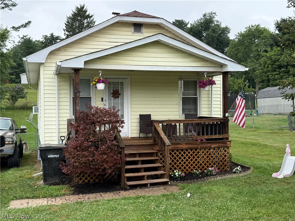 Check out this cozy 2-bedroom, 1-bath home situated on a spacious lot in Zanesville.  This inviting property features a covered front porch, bright living areas, dining area, and a functional floor plan perfect for first-time homebuyers, downsizers, or investors. Enjoy the peaceful setting with plenty of fenced in backyard space for gardening, entertaining, or just relaxing, also perfect if you have dogs or small children!  Conveniently located just minutes from shopping, dining, schools, and other local amenities.  Don't miss this great opportunity to make this home your own!