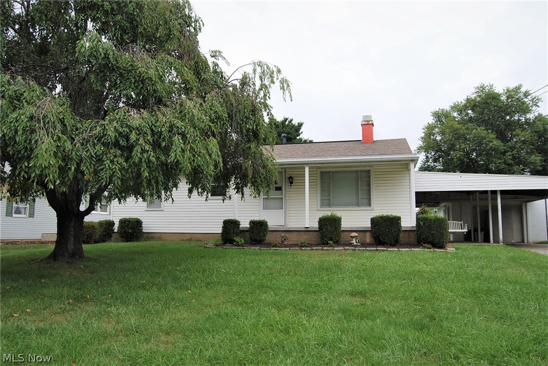 Charming 3 bdrm north end ranch. Living room has nice cozy fireplace.  Lower level lots of room to have a family room and has a room for your workshop.
Roof is 5 years. Gas heat and central air. Carpeting with hardwood floors. Outside nice covered patio and level yard. Nice block garage and carport with plenty of room for parking. You will love the easy access to all your restaurants, shopping banking and hospital. Call for your private viewing.