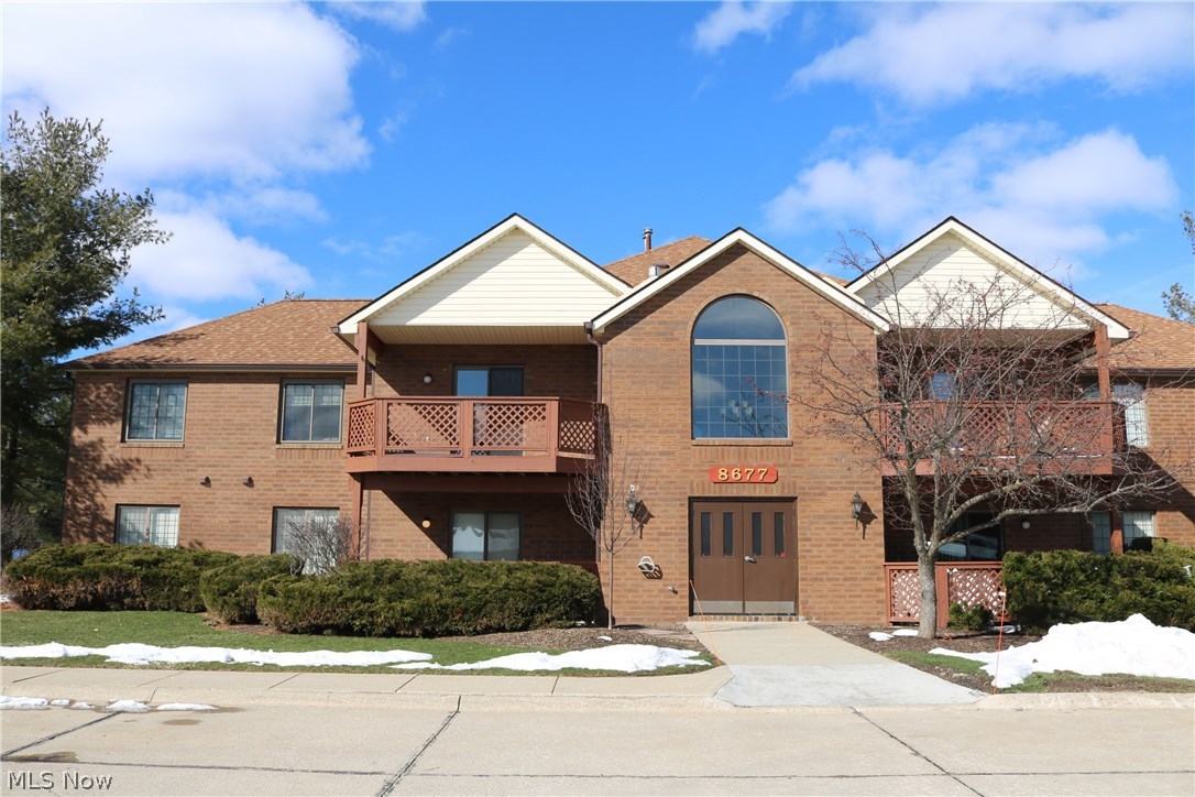 All brick condo in the Country Lakes subdivision.  Vaulted ceilings, lots of natural light and open floor plan.  Great room with corner gas fireplace and sliding door to your private deck.  Loads of kitchen cabinets, all appliances stay.  In-suite Laundry with utility tub, stacked washer & dryer stay.  Spacious dining room.  2 bedrooms and 2 full baths.  Private storage area off your private deck.  Tiled floor when you enter, in the kitchen, the laundry area, and both bathrooms.  Master bedroom with large walk-in closet and ensuite full bath.  Private one car garage.  The community area has an in-ground pool, stocked lake for catch and release fishing, playground, fenced basketball court and tennis court. Very close to Downtown Cleveland, the Airport, and freeway access.  Excellent Brecksville / Broadview Hts schools.