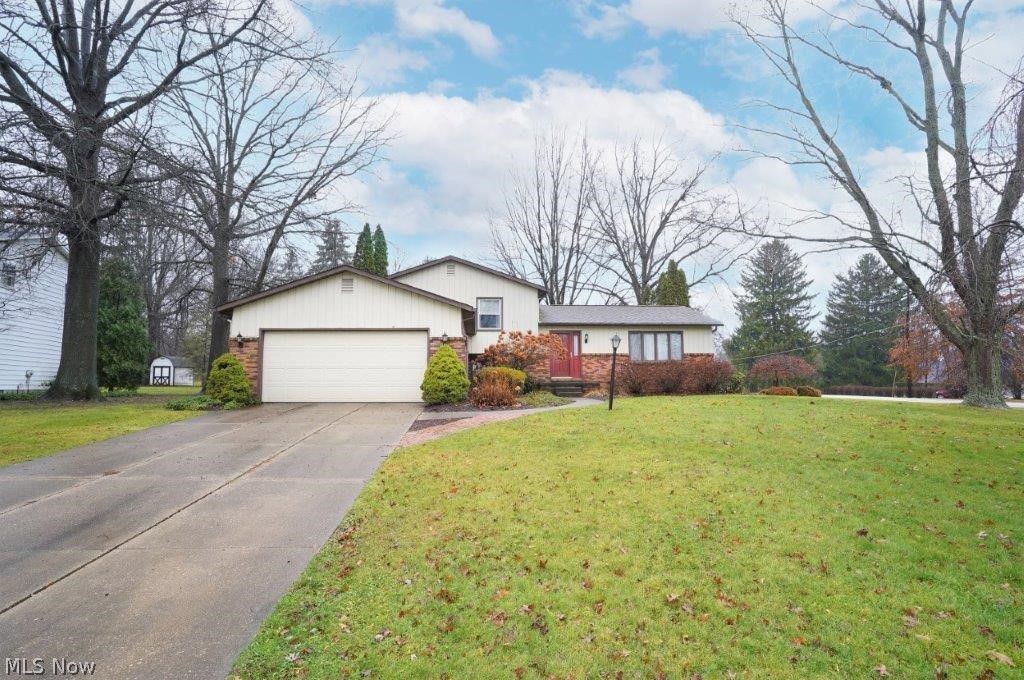 Step inside and check out this fabulous Tallmadge split level!  You will love this large, open floor plan with plenty of space on every floor! This fabulous Tallmadge 4 level split level features over 2000 square feet of living space! The master bedroom features a full bath and the  house features 3 full baths. Other features include Windows 2015, glassblock 2021, AC 2015, Exterior painted, and additional attic insulation. The outside features include nice large yard with a deck off of the kitchen/dining area. This home offers something for everyone and for all seasons. Call your favorite real estate professional today and schedule your private showing!
