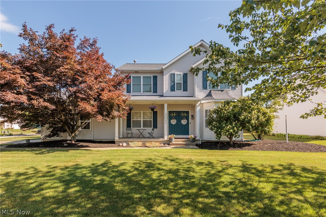 Welcome to 33340 Heartwood — the home you’ve been waiting for!This beautifully updated colonial is truly move-in ready, featuring a complete top-to-bottom renovation and situated on a spacious half-acre lot (two parcels) in a highly desirable eastern Avon neighborhood. Step onto the charming front porch and into a bright, inviting interior highlighted by brand-new luxury vinyl plank flooring and 9-ft ceilings throughout the main level, creating a seamless, open, and modern feel.The expansive kitchen is the true heart of the home, stretching from front to back and designed for both everyday living and entertaining. It showcases soft-close cabinetry, quartz countertops, a custom backsplash, a large island, and SS appliances—including a gas range with a vent hood. The kitchen flows effortlessly into the generous family room, anchored by a cozy gas log fireplace. At the front of the home, a versatile living room offers flexible use as a playroom, office, or additional sitting area. An updated half bath and a thoughtfully designed laundry room with custom storage complete the main floor. Upstairs, the spacious primary suite features a fully renovated ensuite bathroom. Three additional bedrooms and an updated full bath provide plenty of room for family and guests. The lower level adds even more versatility, offering additional living space, a bedroom, and a full bath—ideal for guests, a home office, or a private retreat. Enjoy outdoor living all summer long on the large patio with a gazebo and outdoor bar, already wired for a TV and fan—perfect for relaxing or entertaining. Conveniently located just minutes from Avon Commons, shopping, dining, highways (I-90 and I-480), and the airport, this home combines comfort with accessibility. Even better, the welcoming, family-friendly neighborhood has no HOA.  Don’t miss your opportunity to make this home yours—be sure to review list of updates and improvements.  Roof 2012, A/C 2017, Furnace 2018, sump pump w battery backup 2017