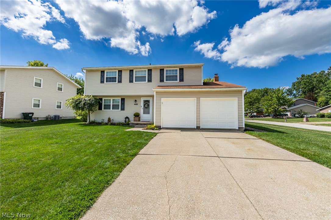 Welcome to this stunning Colonial home located in Stow on a corner lot! The living room has a large picture window that allows the natural light to shine on the beautiful hardwood floors. The living room opens into the dining room and kitchen which would be great for entertaining. The kitchen has all been updated  with dark cupboards that accent the gray subway tile, granite countertops, and stainless appliances. The kitchen opens to the family room that has newer carpet and a sliding glass door to the patio. Upstairs boosts 4 nice sized bedrooms with newer carpets. The master boosts chair molding and has an en suite. Do not miss the finished basement, which makes the perfect recreation spot. Step on the patio and take a look at the amazing fenced in backyard! Sit in the back and enjoy these pretty fall days! So many updates have been made to this home including, new furnace in 2020. Do not miss out on this amazing home!