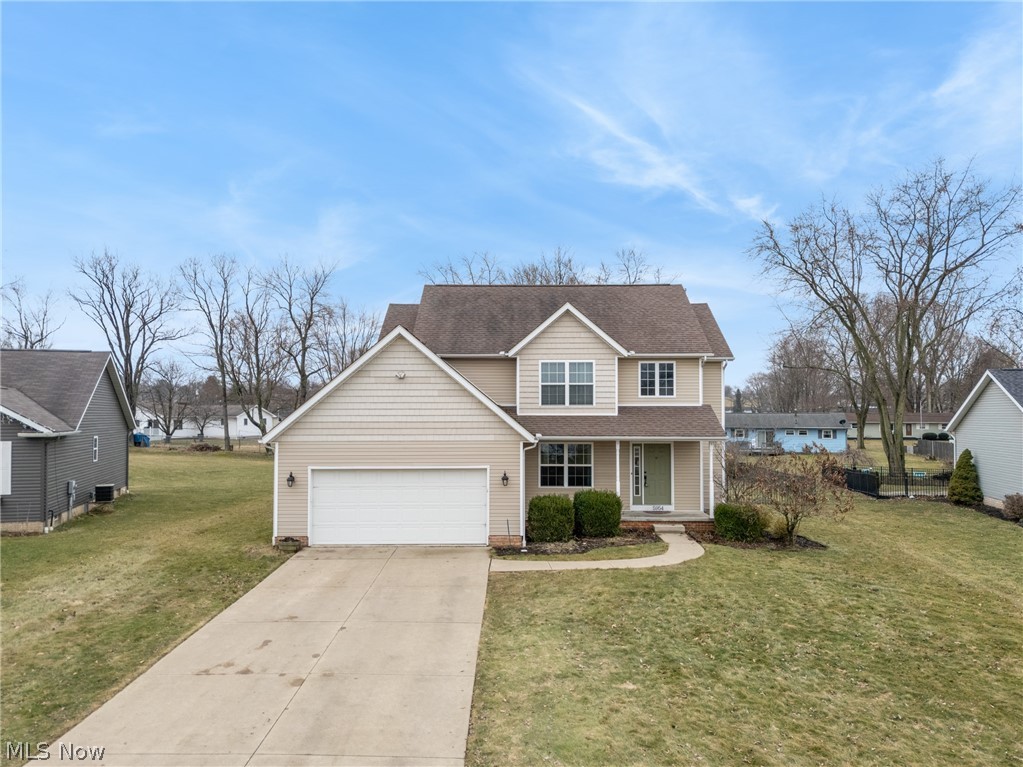 Welcome to 5954 Wentworth Ln SW in the Perry Local School District! This well-cared-for Colonial offers a warm, inviting layout that’s great for both everyday living and entertaining. You’re greeted by a beautiful two-story foyer with hardwood floors and an open staircase that makes a great first impression. The eat-in kitchen is set up for anyone who loves to cook or host, featuring stainless steel appliances, an island, tile backsplash, and plenty of workspace, flowing right into the dining room and the cozy family room with a gas log fireplace. A first-floor laundry and half bath add convenience to the main level. Upstairs, the spacious owner’s suite includes an ensuite bath with soaking tub, shower, dual vanity, two closets, plus three additional bedrooms and another full bath. The finished lower level adds 621 sq ft of extra living space with room for a rec area, workout space, or office, along with unfinished storage. Outside, enjoy the flat, fully fenced backyard from the Trex composite deck, perfect for relaxing or hosting friends. Recent updates include HVAC (furnace & A/C) and hot water tank (2017), new water softener (2026), radon mitigation system, brand new dishwasher, and a new toilet in the owner’s bath. Massillon Cable recently ran fiber internet through the neighborhood, and there’s no HOA. All kitchen appliances plus the washer and dryer stay, making this home truly move-in ready in a super convenient location.