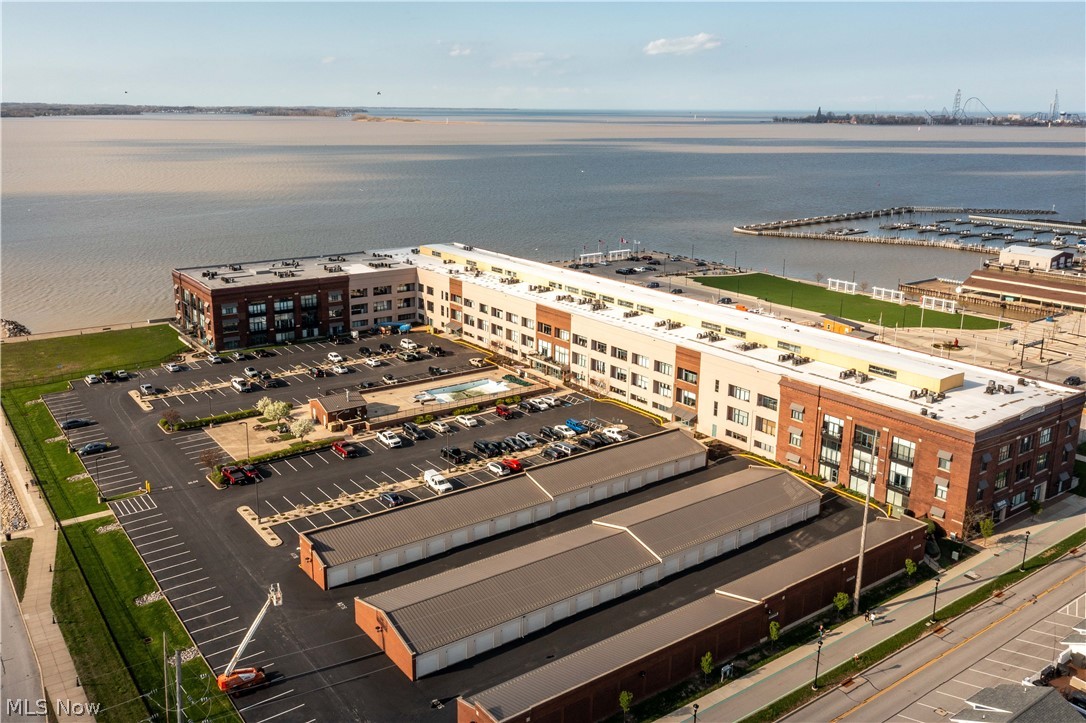 Best value in Chesapeake Lofts - currently the lowest priced 2 bedroom, 2 full bath condo available! This is your opportunity to own in one of downtown Sandusky's most sought-after waterfront communities. This desirable first-floor residence is being offered fully furnished and turnkey, featuring modern finishes and signature loft-style character, offering both style and versatility with immediate possession available just in time to enjoy the full summer season.

Residents enjoy premier amenities including a large pool, spa, fitness center, secured entry, and direct access to the city marina next door. Convenient first-floor living allows you to pull right up to the patio to easily unload groceries, luggage, and belongings with no need for the elevator, while the patio's location away from the pool offers a more peaceful and private setting. Ideally located just steps from the marina, Jackson Street Pier, and within walking distance to downtown Sandusky's vibrant dining, shopping, entertainment, events, and ferry access to the Lake Erie islands.

Short-term rentals are permitted, offering the flexibility to enjoy as a private retreat, income-producing property, or a combination of both. A standout opportunity where value, location, and lifestyle come together effortlessly.