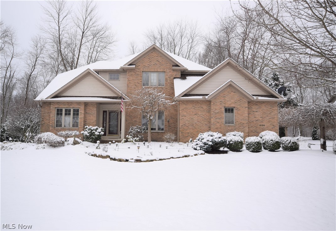 Welcome to 1238 Maxfli Drive in Akron! This beautiful 4-bedroom, 3-bathroom home is situated in Chenoweth Country Club Estates. Walk into
the front door to be greeted by the stunning two-story foyer! The eat-in kitchen has hardwood floors and gorgeous granite countertops. A large
island provides tons of extra storage space, as well as an extra seating area. Spacious living room has a fireplace and sliding glass doors that
lead to the back porch. The formal dining room offers a great place for dinners and entertaining. A bonus room is located right inside the front
door -- the perfect spot for an office, play room, etc. All bedrooms are huge with ample amounts of closet space! The Owners Suite bathroom has
convenient double sinks and a large Jacuzzi tub. Basement is clean and recently painted. This home has immaculate curb appeal with lovely
landscaping and a three-car attached garage. This home also features a newer roof, hot water tank, and interior paint. Schedule a private
sh