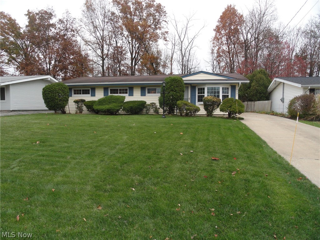 Welcome home to this 4 bedroom 2 full bath Ranch in Northfield Village. A very well maintained home with an updated kitchen, updated master bath, newer carpet, new windows in '15 and new  HVAC in '09. A cathedral ceiling in the living and dining room creates a great open and spacious feeling. Sliders from the dining room step out to a huge patio/parking area and a 2 car garage with extra workshop.  The backyard overlooks a wooded area for extra privacy.  All appliances included plus a home warranty too! Don't hesitate to call today!
